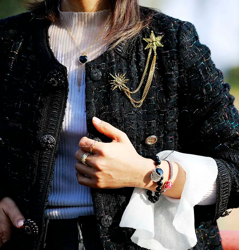 Model wearing Black Onyx heart pendant  necklace and Heart charm bracelets from ALLORA JADE