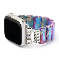 Smartwatch with a colorful beaded bracelet on a white background. Purple Aqua Jasper Stretchy Apple Watch Band - silver | ALLORA JADE