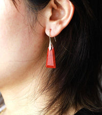 Model wearing Red Jasper Ascend Earrings – red crystal drop earrings with silver hook, handmade by Allora Jade
