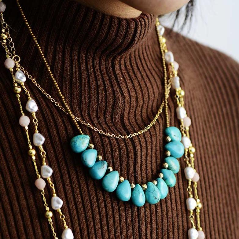 Turquoise and store gold bead necklace