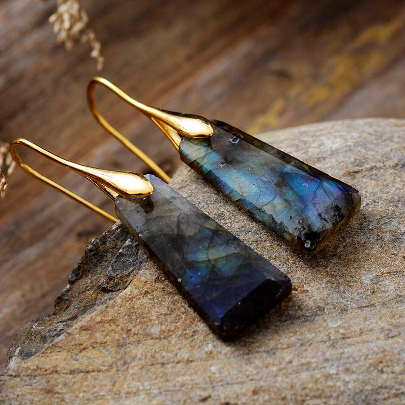 Labradorite Ascend Earrings – handmade gold gemstone earrings with faceted iridescent stones on neutral background. ALLORA JADE