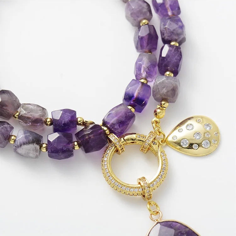 Purple beaded necklace with gold accents on a white background. Amethyst Pavé Statement Necklace | ALLORA JADE