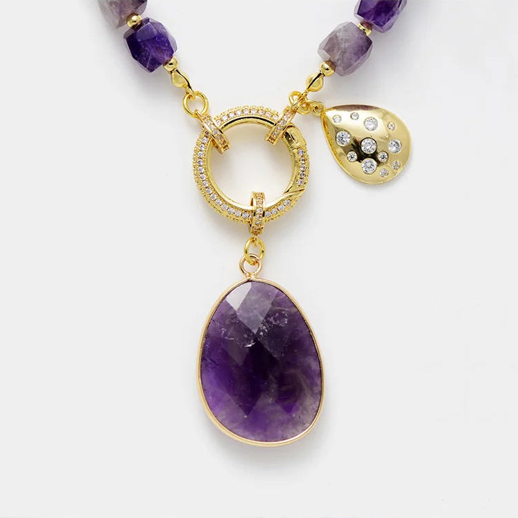 Purple beaded necklace with gold accents on a white background. Amethyst Pavé Statement Necklace | ALLORA JADE