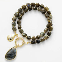 Beaded necklace with gold clasp and pendant on a white background. Labradorite Pavé Statement Necklace | ALLORA JADE