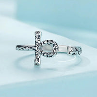 Ankh Egyptian Cross Sterling Silver Ring with intricate design on a light blue background