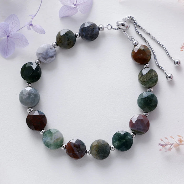 Bracelet with multicoloured Indian Agate beads on a white background